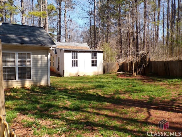 view of yard featuring fence