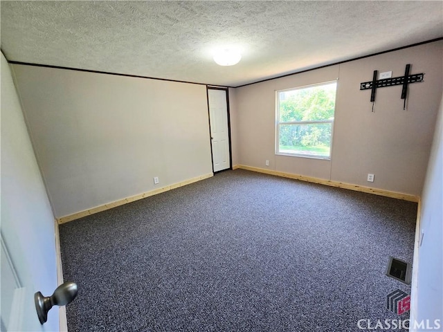 305 Langford Carey Rd, Danielsville, GA 30633 - carpeted spare room with a textured ceiling and baseboards