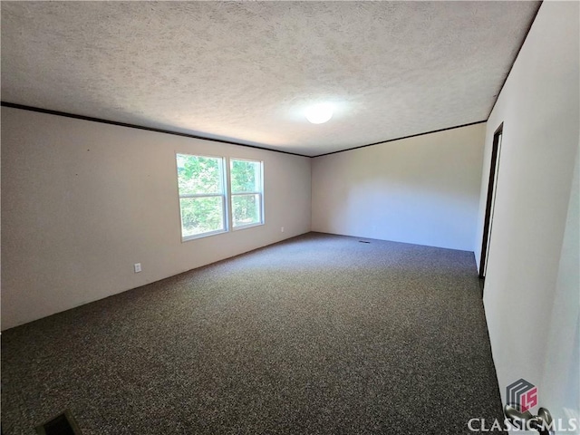 305 Langford Carey Rd, Danielsville, GA 30633 - spare room with carpet floors and a textured ceiling