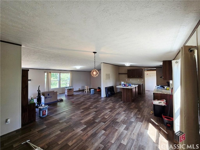 305 Langford Carey Rd, Danielsville, GA 30633 - living room with a textured ceiling and dark wood finished floors