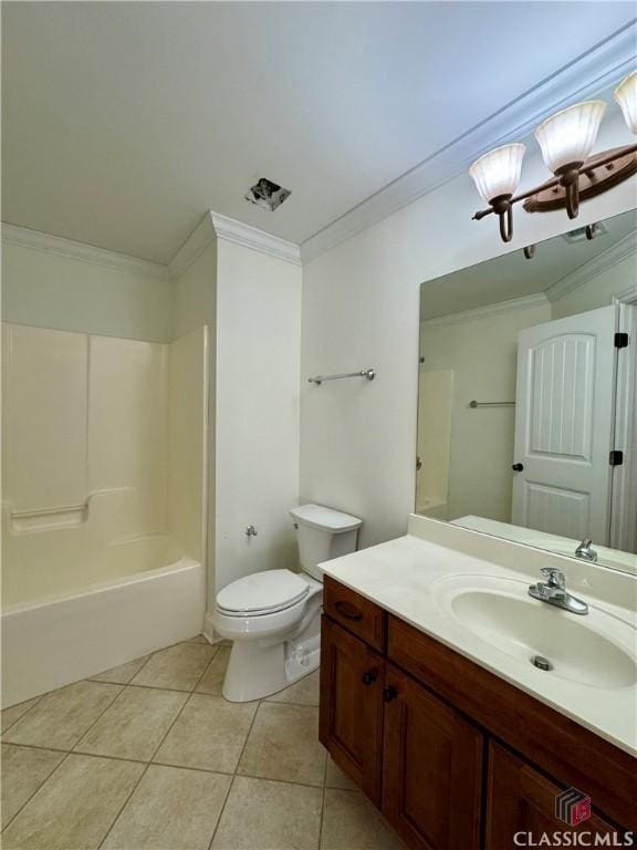 bathroom featuring tile patterned flooring, crown molding, toilet, bathtub / shower combination, and vanity