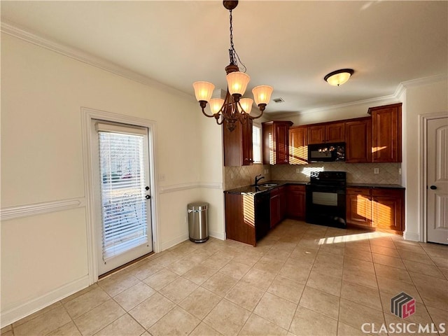 kitchen featuring black appliances, dark countertops, tasteful backsplash, and a sink