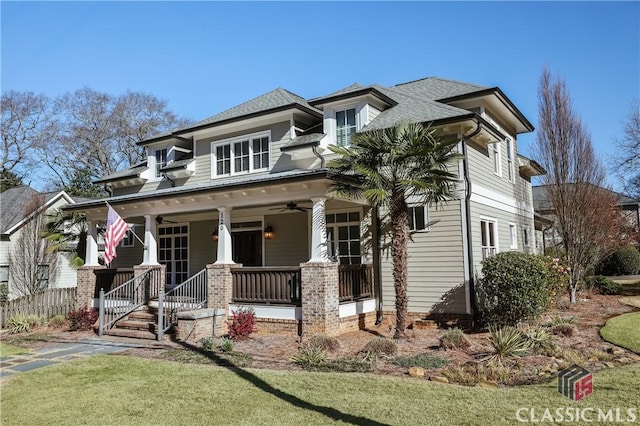 view of front of home with a porch and ceiling fan