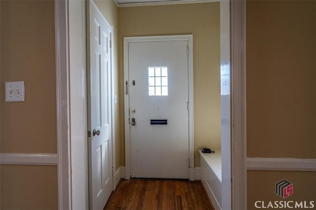 doorway with dark wood-style floors