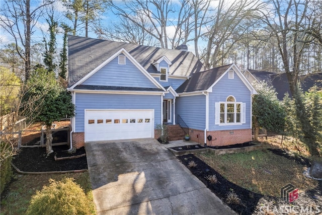 view of front of home with concrete driveway, brick siding, a garage, and a chimney