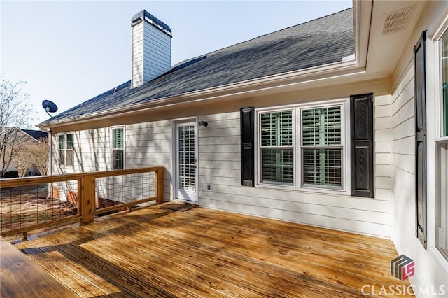 wooden terrace with visible vents