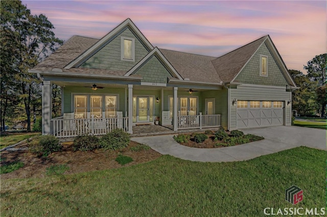 view of front of house with a porch, driveway, and ceiling fan