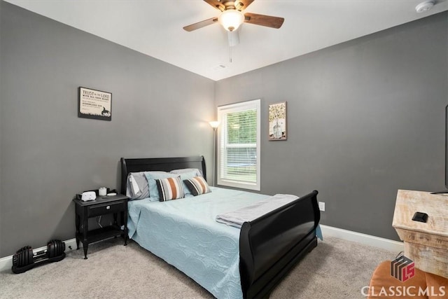 bedroom with baseboards, light colored carpet, and ceiling fan