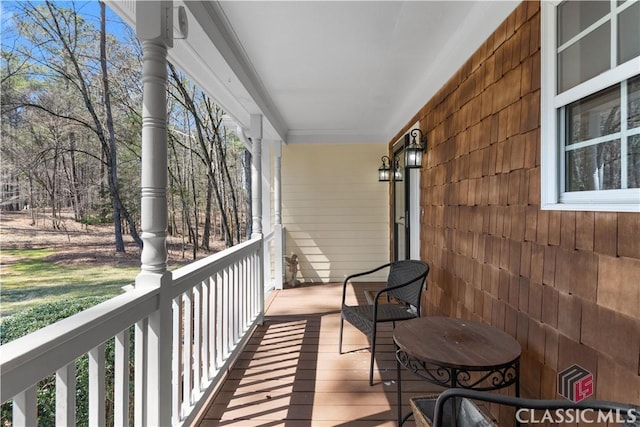 balcony featuring covered porch