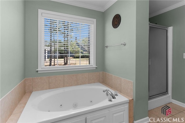 full bath featuring tile patterned floors, a tub with jets, a stall shower, and ornamental molding