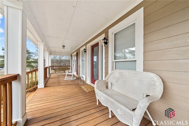 deck with covered porch