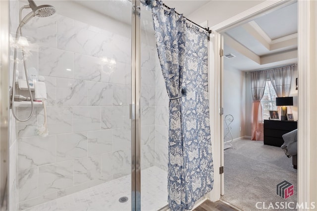 bathroom with visible vents, ensuite bathroom, ornamental molding, and a shower stall