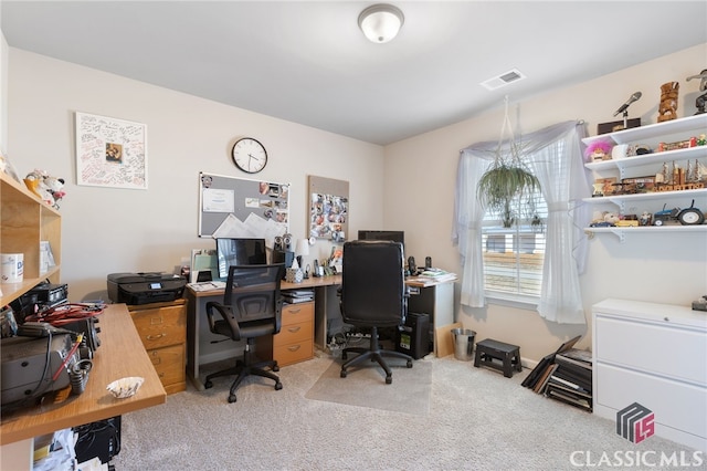 office featuring visible vents and light colored carpet