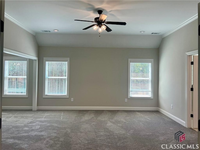 unfurnished room featuring vaulted ceiling, carpet flooring, and visible vents