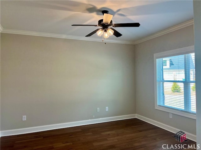 empty room with a ceiling fan, crown molding, baseboards, and dark wood-style flooring