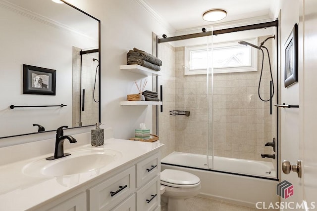 full bath with tile patterned floors, toilet, ornamental molding, shower / bath combination with glass door, and vanity