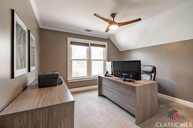 home office featuring visible vents, baseboards, light colored carpet, ceiling fan, and vaulted ceiling