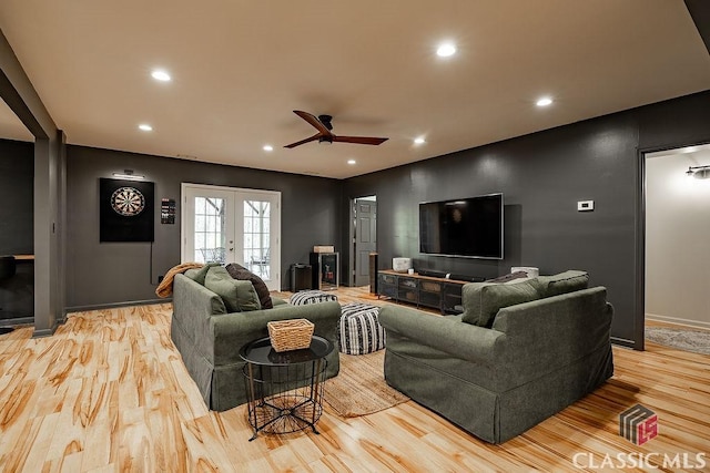 living area with recessed lighting, light wood-style flooring, french doors, and ceiling fan