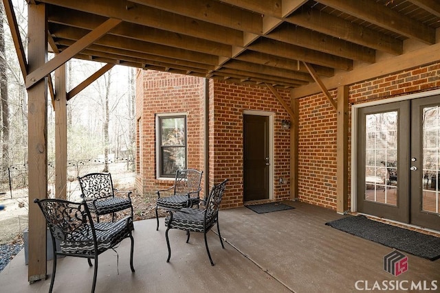 view of patio featuring french doors