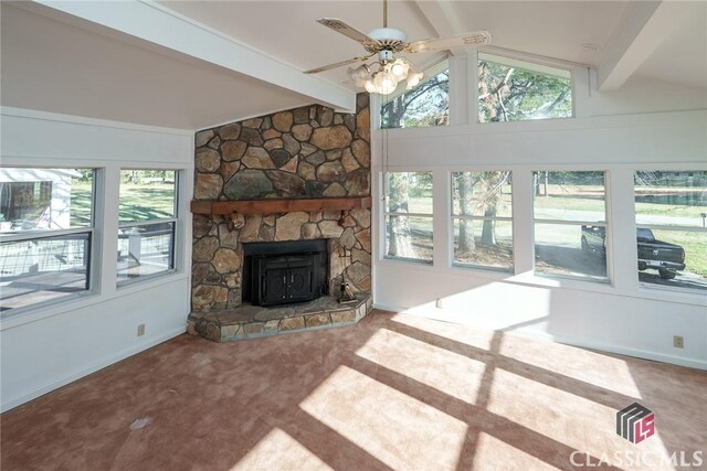 1050 Eugene Ln, Madison, GA 30650 - carpeted living area with lofted ceiling with beams, baseboards, and a ceiling fan
