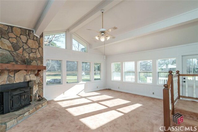 1050 Eugene Ln, Madison, GA 30650 - sunroom / solarium with a wood stove, high vaulted ceiling, baseboards, carpet floors, and beamed ceiling