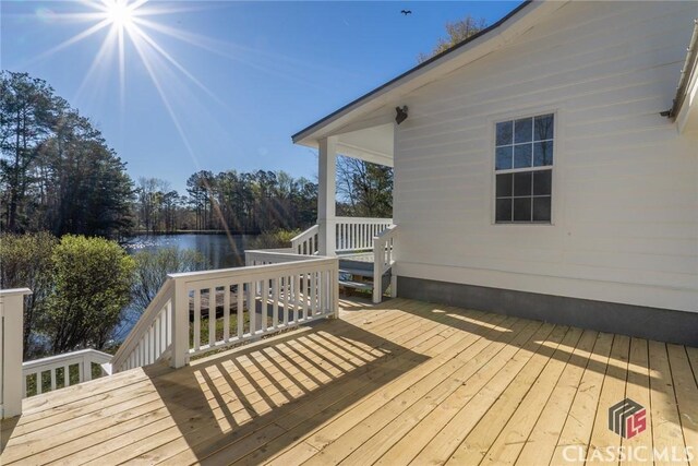 1050 Eugene Ln, Madison, GA 30650 - wooden terrace featuring a water view