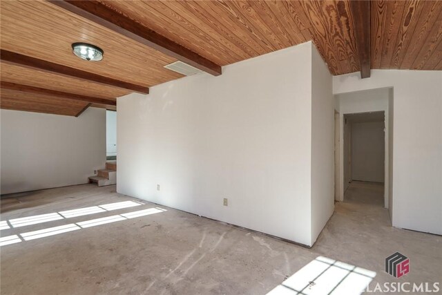 1050 Eugene Ln, Madison, GA 30650 - interior space featuring beamed ceiling, unfinished concrete flooring, stairway, and wooden ceiling