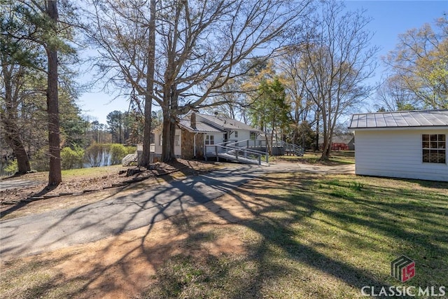 1050 Eugene Ln, Madison, GA 30650 - view of yard featuring a deck