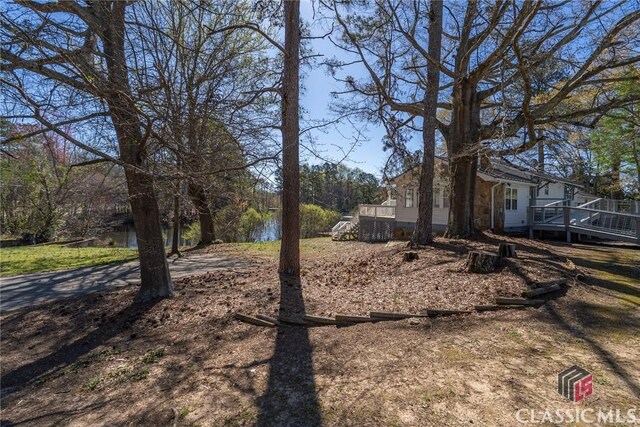 1050 Eugene Ln, Madison, GA 30650 - view of yard featuring a deck