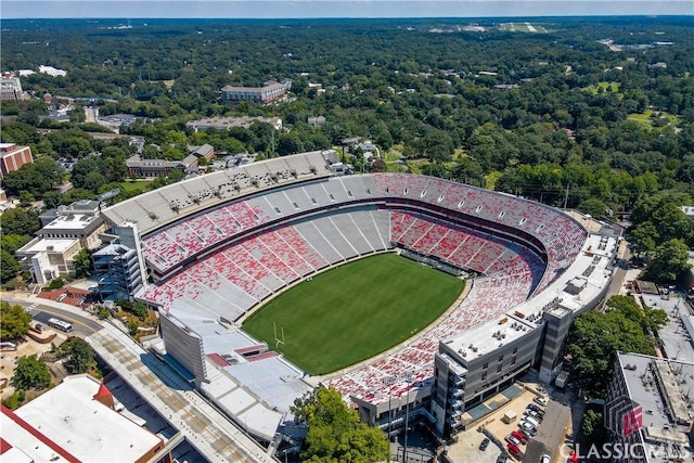 aerial view featuring a wooded view