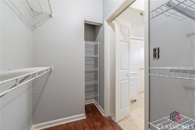 walk in closet featuring light wood-style floors
