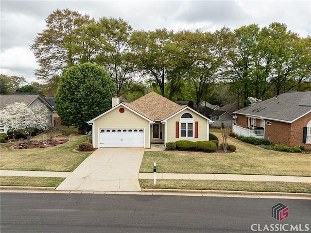ranch-style home with a front lawn, a garage, and concrete driveway
