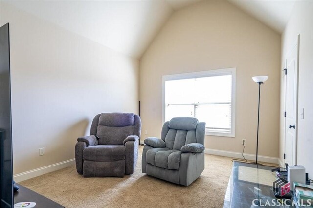 1296 Club Estates Rd, Statham, GA 30666 - sitting room with carpet floors, baseboards, and vaulted ceiling