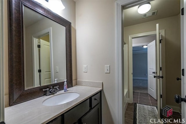1296 Club Estates Rd, Statham, GA 30666 - bathroom with visible vents, tile patterned floors, and vanity