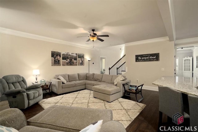 1296 Club Estates Rd, Statham, GA 30666 - living area featuring ceiling fan, dark wood finished floors, ornamental molding, stairway, and baseboards