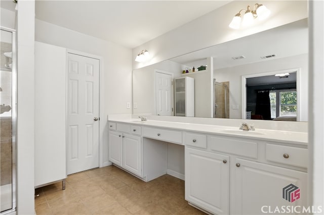 340 Hammersmith Dr, Suwanee, GA 30024 - bathroom featuring double vanity, a shower stall, and tile patterned flooring