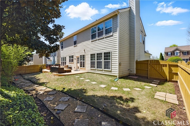 340 Hammersmith Dr, Suwanee, GA 30024 - back of property featuring outdoor lounge area, a chimney, a patio, and a gate