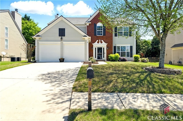 340 Hammersmith Dr, Suwanee, GA 30024 - traditional-style home with brick siding, driveway, a front lawn, a garage, and central AC unit