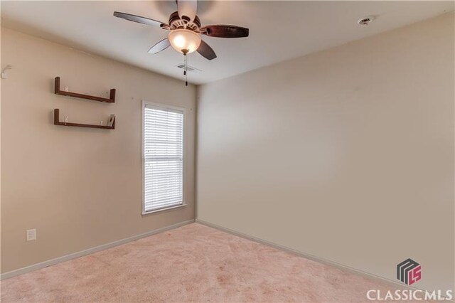 6706 Mill Rock Ct, Hoschton, GA 30548 - unfurnished bedroom featuring visible vents, baseboards, a closet, ceiling fan, and light carpet