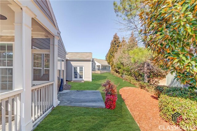 6706 Mill Rock Ct, Hoschton, GA 30548 - rear view of house with a patio
