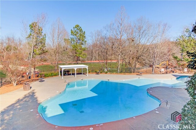 6706 Mill Rock Ct, Hoschton, GA 30548 - view of sport court with fence and community basketball court