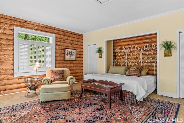 bedroom with log walls and crown molding