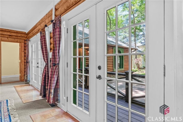 entryway featuring french doors