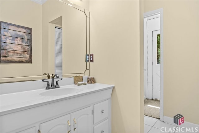 bathroom featuring tile patterned floors and vanity