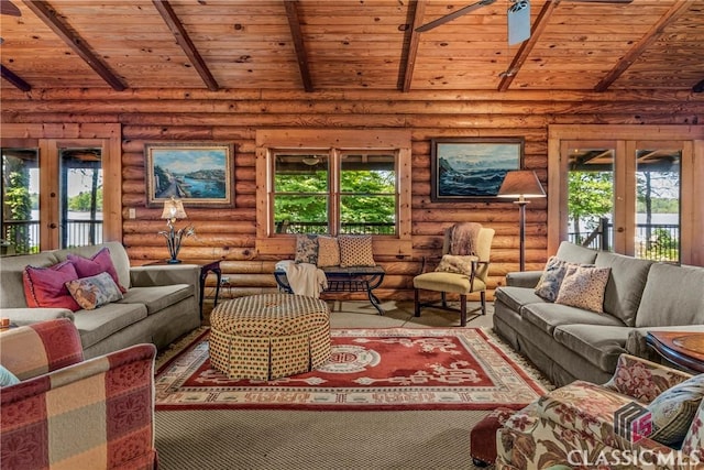 living area with a wealth of natural light, french doors, and wood ceiling