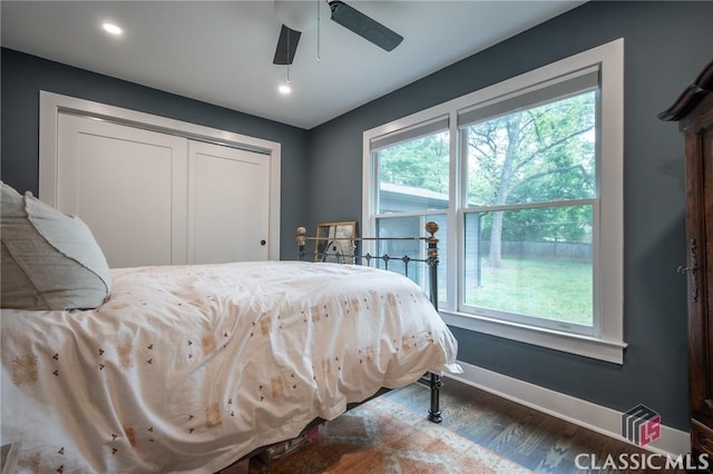 bedroom featuring recessed lighting, a closet, ceiling fan, baseboards, and wood finished floors