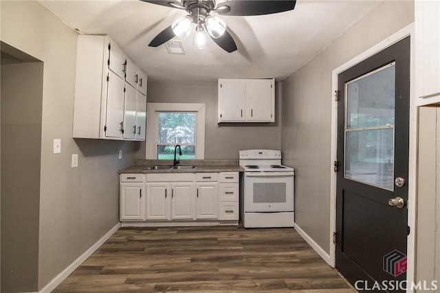 451 N Woodlawn Dr, Crawford, GA 30630 - kitchen with a sink, white electric range, white cabinetry, a ceiling fan, and dark wood-type flooring