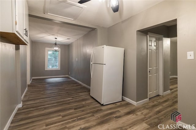 451 N Woodlawn Dr, Crawford, GA 30630 - interior space with baseboards, dark wood-style flooring, white cabinetry, and freestanding refrigerator
