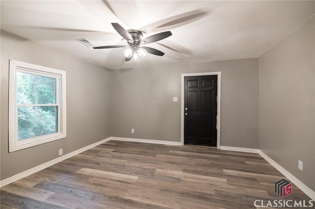 451 N Woodlawn Dr, Crawford, GA 30630 - spare room with wood finished floors, visible vents, baseboards, and ceiling fan