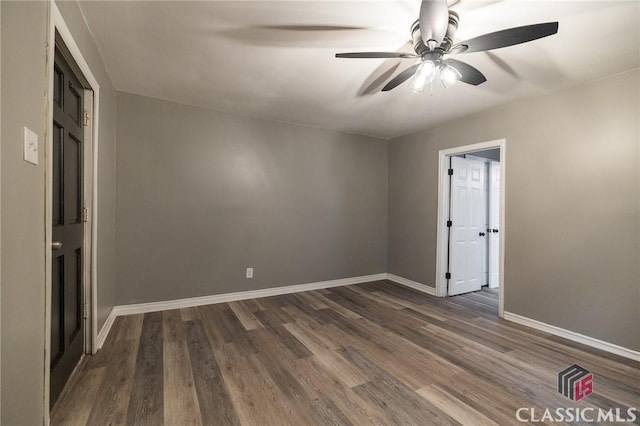 451 N Woodlawn Dr, Crawford, GA 30630 - unfurnished room featuring a ceiling fan, baseboards, and dark wood-style flooring
